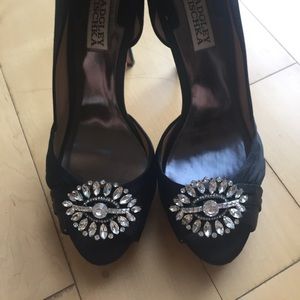 Badgley Mischka Black bejeweled satine pumps.